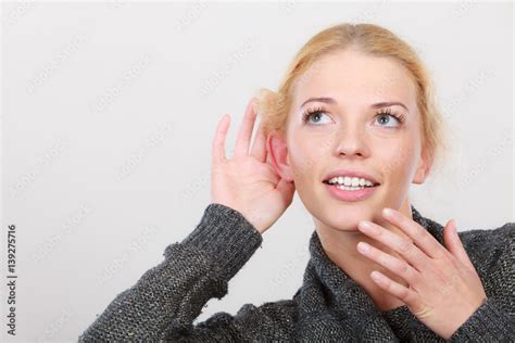 Woman Put Hand To Ear For Better Hearing Stock Foto Adobe Stock