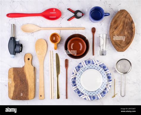 Assorted Kitchen Utensils Over Marble Background Stock Photo Alamy