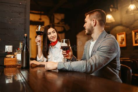 Man And Woman Flirting In Bar Couple At Counter Stock Image Image Of