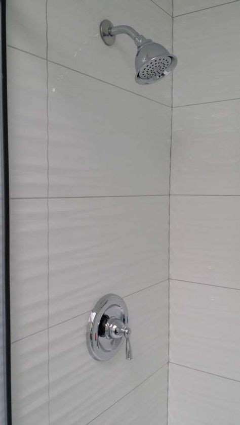 Wavy White Tiles In Shower Grey Grout Bathroom Shower Walls