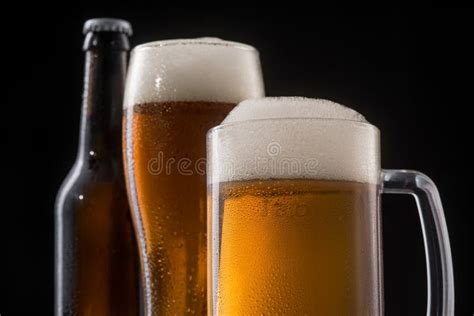 Bottle And Glasses Of Beer Stock Image Image Of Foam 129858475