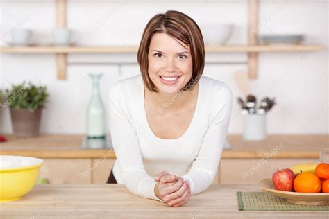 Profile Portrait Of A Smiling Woman In Kitchen Stock Photo Racorn