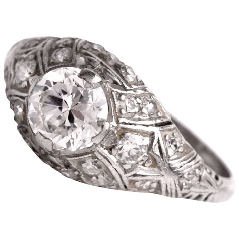 Colours of diamonds range from colourless, yellow. Antique Diamond Platinum Filigree Engagement Ring at 1stdibs