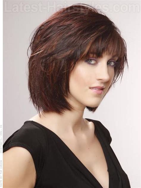 Layered Brunette Shag Chin Length Haircut With Red Highlights Chin