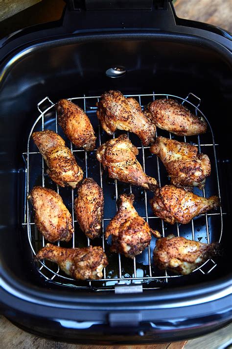 Air fryers have gained popularity for producing crispy, evenly browned fried foods without the use of an actual deep fryer. Extra Crispy Air Fryer Chicken Wings - Craving Tasty