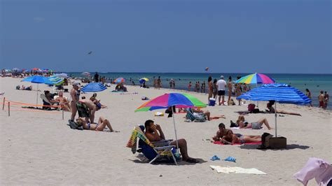 People Relaxing On Holidays In South Beach Miami Beach Florida Usa