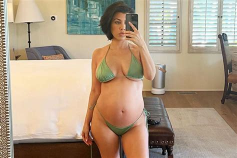Pregnant Kourtney Kardashian Proudly Shows Off Her Growing Baby Bump In