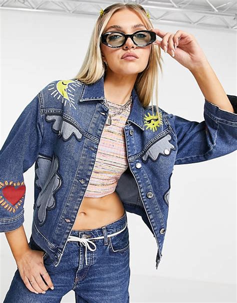 love moschino patched denim jacket in blue asos