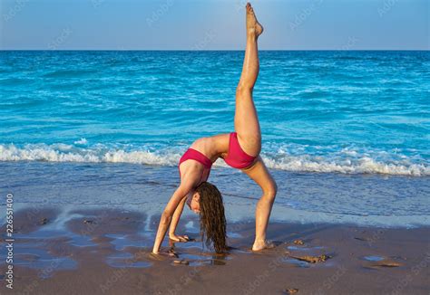 Acrobatic Gymnastics Bikini Girl In A Beach Stock Photo Adobe Stock