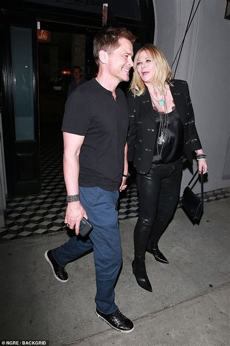Rob Lowe Looks Smitten With Wife Sheryl Berkoff As They Hold Hands On