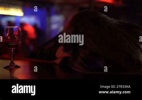 Drunk Woman Sleeping On Bar Counter Near Empty Wine Glass Alcohol Addiction Stock Video Footage