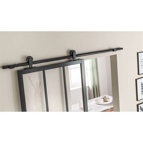 • finesse du montant central (46 mm de large) • design contemporain et lignes arrondies • poignée de tirage stylisée • butée de fin de course pour protéger. Rail coulissant Bolero 2 noir, pour porte de largeur 93 cm ...