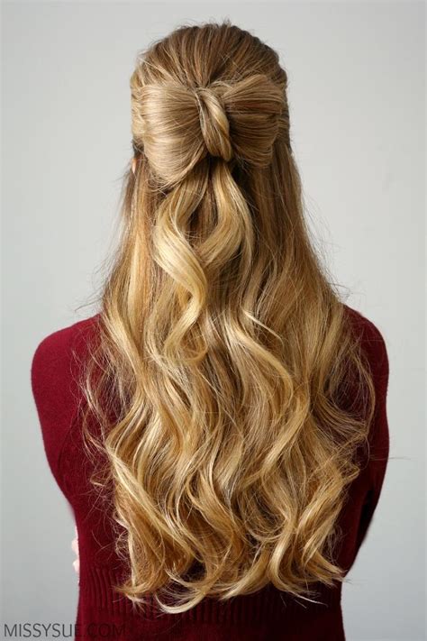 High bun and blunt, choppy bangs. Stunning Curly Holiday Hairstyles - Southern Living