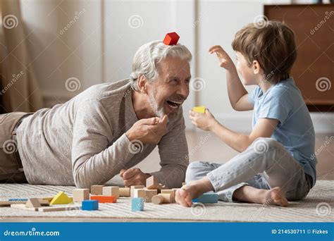 Happy Senior Grandfather Play With Small Grandson Stock Image Image