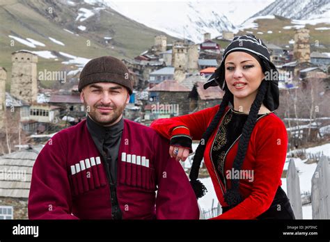 Georgian Couple In National Costumes In Village Ushguli In The