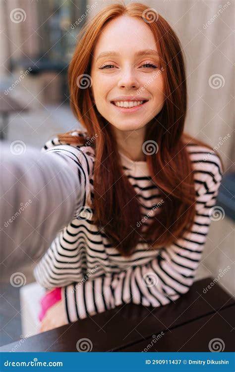 Vertical Pov Shot Of Happy Young Woman Talking Video Call Or Taking Selfie Picture Looking At