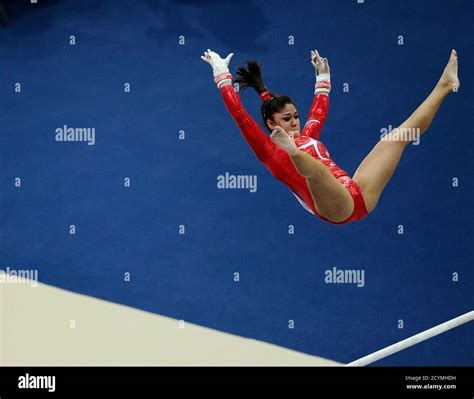 Canadas Jessica Savona Competes On The Uneven Bar At The Qualifying