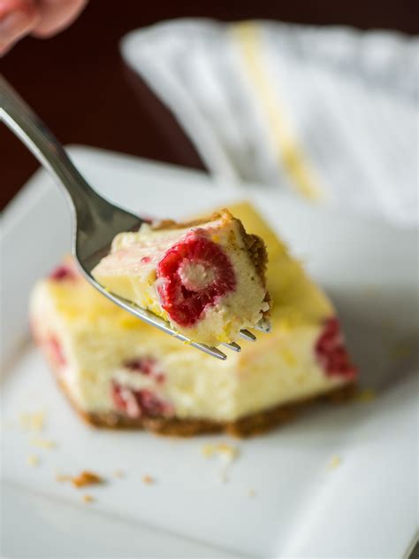 One of the best cheesecakes at the cheesecake factory. Lemon Raspberry Cheesecake Bars - 12 Tomatoes
