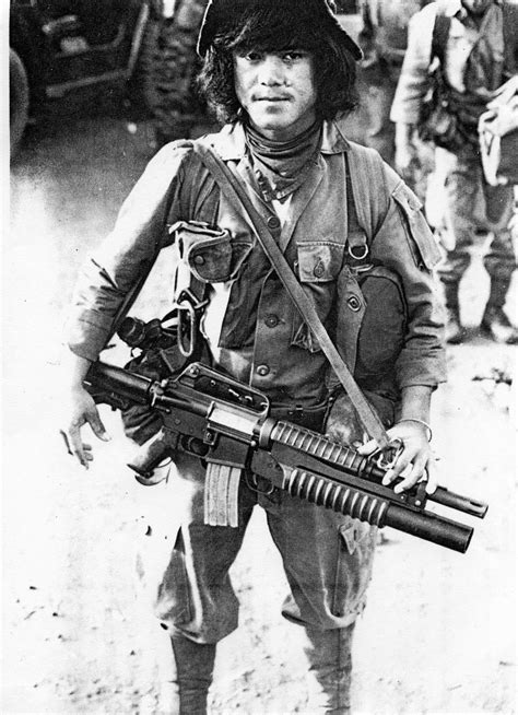 Indig Team Member With An Xm 177e2 With Attached Xm 148 40mm Grenade