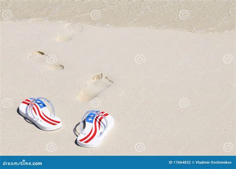 Pair Of Thongs On The Beach Stock Photography Image