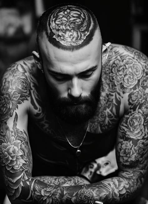 Lexica A Man With Tattoos All Over Black And White