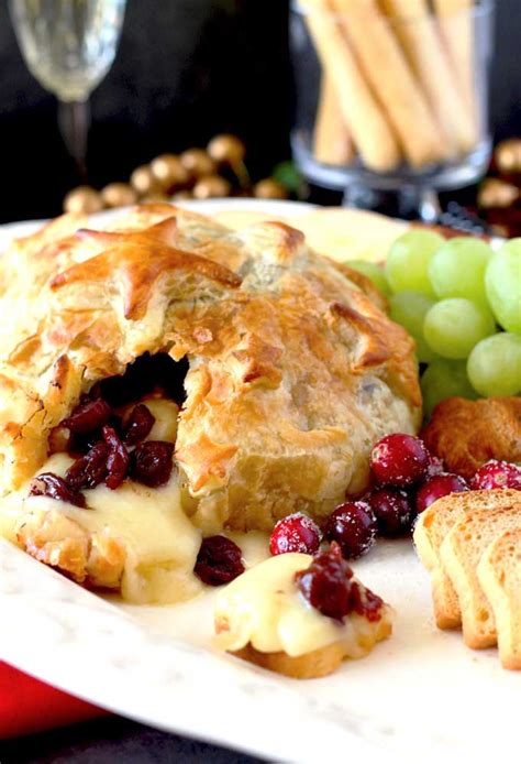A lot of brie is sold as a wheel, so cut out a wedge to get the party started. Baked Brie with Cranberries in Puff Pastry | Lemon Blossoms