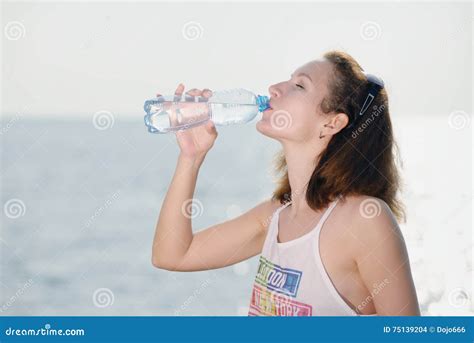 Beautiful Young Woman Drinking Water Stock Photo Image Of Outdoor