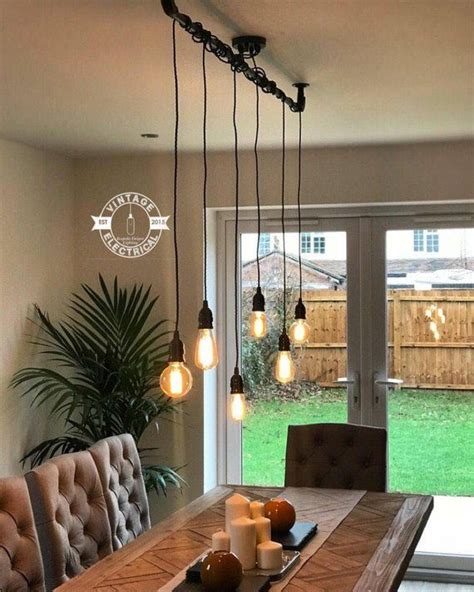 A modern ceiling light over a classic dining table may not be as flattering to the room. The Burnham 6 x pendant drop light hanging lights ceiling ...