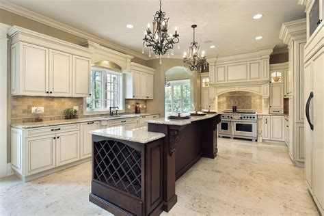 Elegant Kitchen With White Kitchen Cabinets And Espresso Island Quartz Countertops Tile