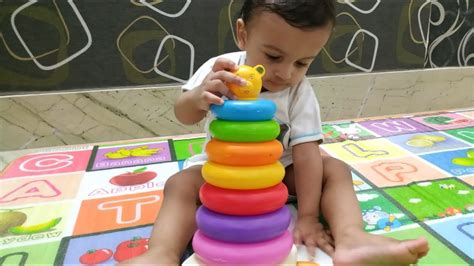 Baby Trying To Stack The Rings Stack Toy Baby Playing With Rings