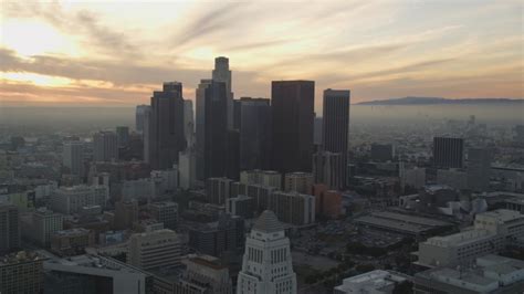 Reverse View Of City Hall And Downtown Los Angeles Skyline At Sunset