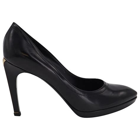 Louis Vuitton Pumps With Gold Heels In Black Leather Ref 898593 Joli