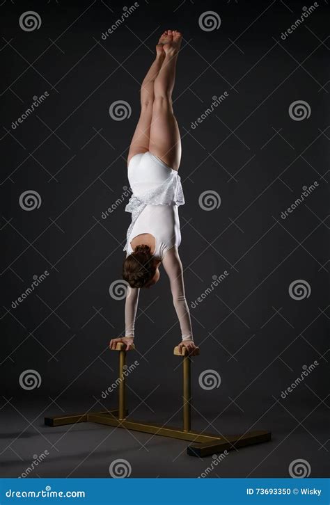 Gymnastics Shot Of Flexible Woman Doing Handstand Stock Photo Image