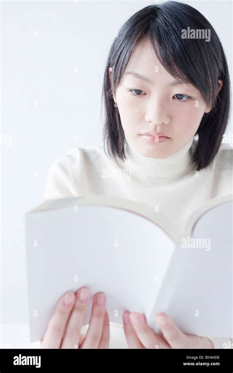 Teenage Girl Reading Book Stock Photo Alamy