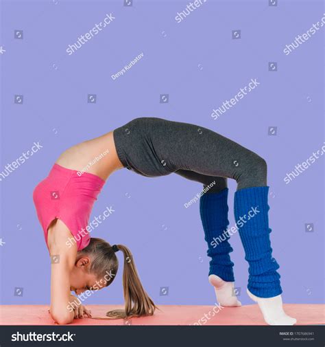 Flexible Healthy Young Woman Bending Over Foto Stok 1707686941