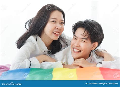 Lgbtq Couple Lovers A Handsome Girl As A Man Or Femme Girl Laying On A