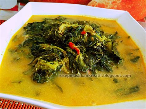 Sangrai kelapa yang telah diparut. RESEP DAUN SINGKONG MASAK SANTAN KUNING - Aneka Resep ...