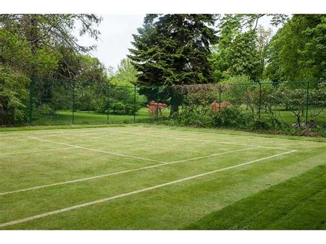 Grass tennis courts, though less expensive than clay, can still be tricky to maintain because they require constant watering. A private backyard grass tennis court! Is this Heaven ...
