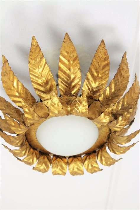 Sunburst Light Fixture In Gold Leaf Gilt Iron And Milk Glass For Sale