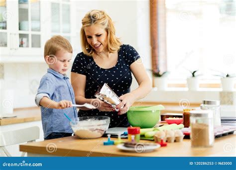 Smart Cute Child Helping Mother In Kitchen Stock Image Image Of Baby