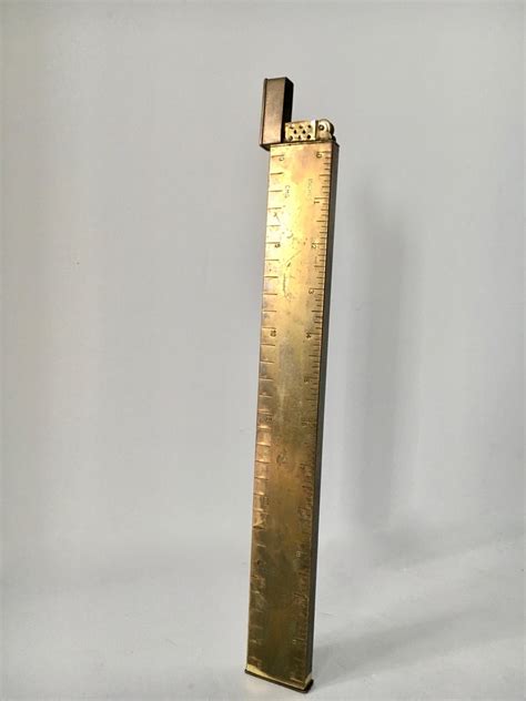 Brass Ruler With Lighter At 1stdibs
