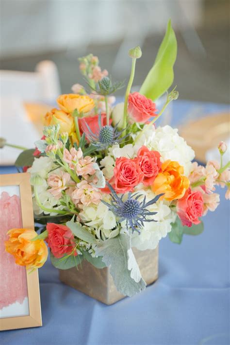 Maybe you would like to learn more about one of these? Coral and Blue Flower Arrangement