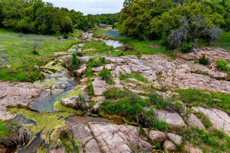 A Rocky Texas Creek With Wildflowers Stock Photo Image Of Wild