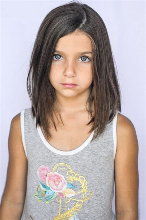 A side part creates style and movement while short layers cut over the ear add the appearance of it is a simple hairstyle for 11 year old boy that will provide a sense of satisfaction to both you and your little lad. Short Hairstyles For 11 Year Olds - Wavy Haircut