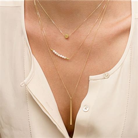 Minimalist Jewelry Is Trending 13 Pieces To Buy And How To Style Them
