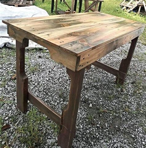 10 to 12 pallet boards, and you can build yourself a durable outdoor pallet table. Scorched Pallet Table - 101 Pallets