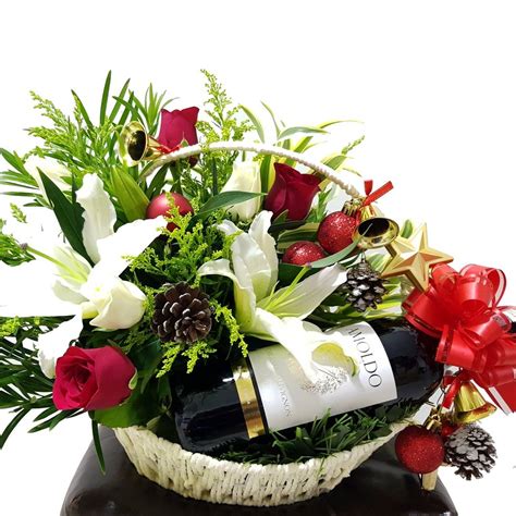We can deliver flowers same day through our network or florists around ireland. Christmas Flower Basket with Wine | Giftr - Malaysia's ...