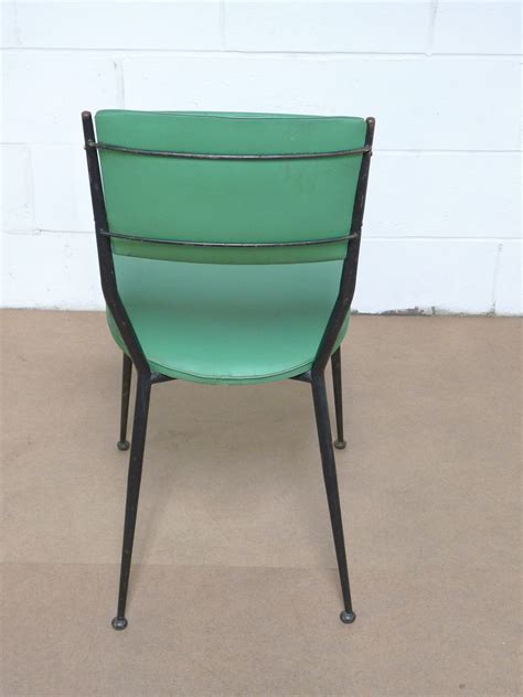 21.5 wide x 19 deep x 37.5 high, with a seat height of 18.5 inches and an arm height of 24.5 inches Mid Century Modern Eames Era 50's Black Steel Dining Chairs Mid Century Modern Eames Era 50's ...