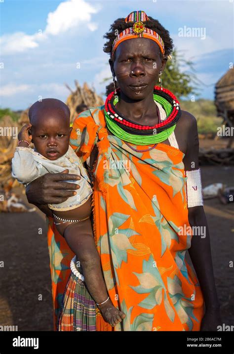 Toposa Tribe Woman Carrying Her Baby Namorunyang State Kapoeta South