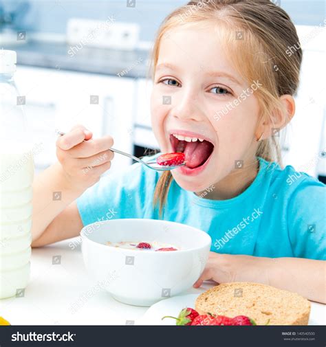 Cute Little Girl Eating Cereal Strawberries Stock Photo 140540500